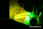 Луч зелёного лазера в флуоресцеине